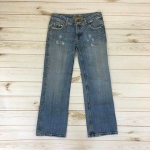 Distressed denim jeans by Miss Me